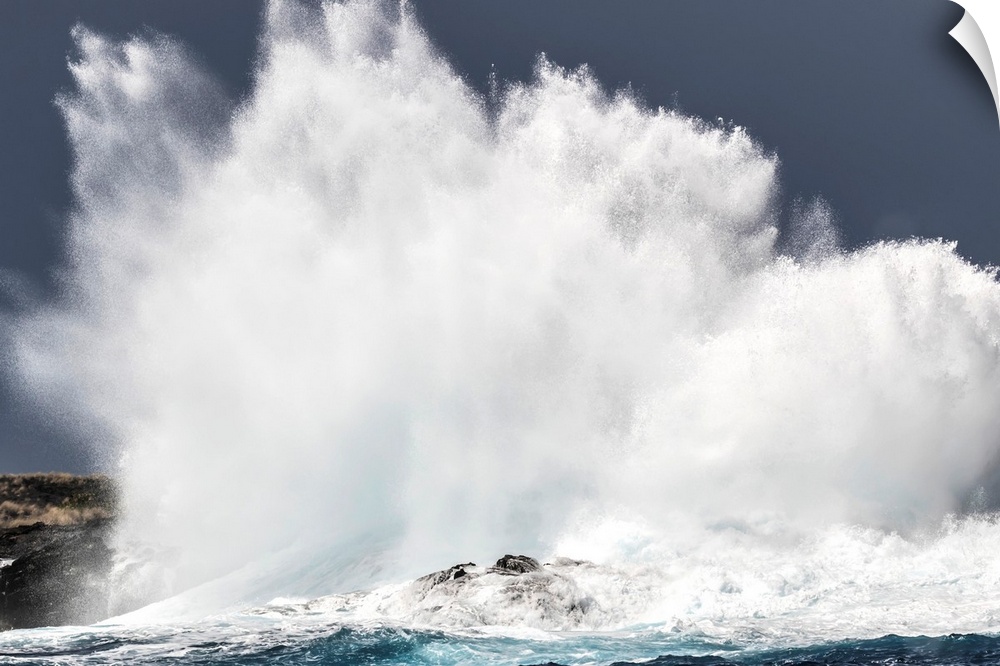 Swell induced wave crashing on the Kona coast, Kona, Island of Hawaii, Hawaii, United States of America.