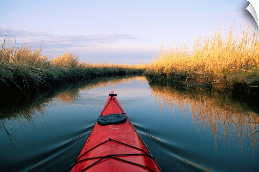 The bow of a kayak points the way in a Chesapeake Bay salt marsh.