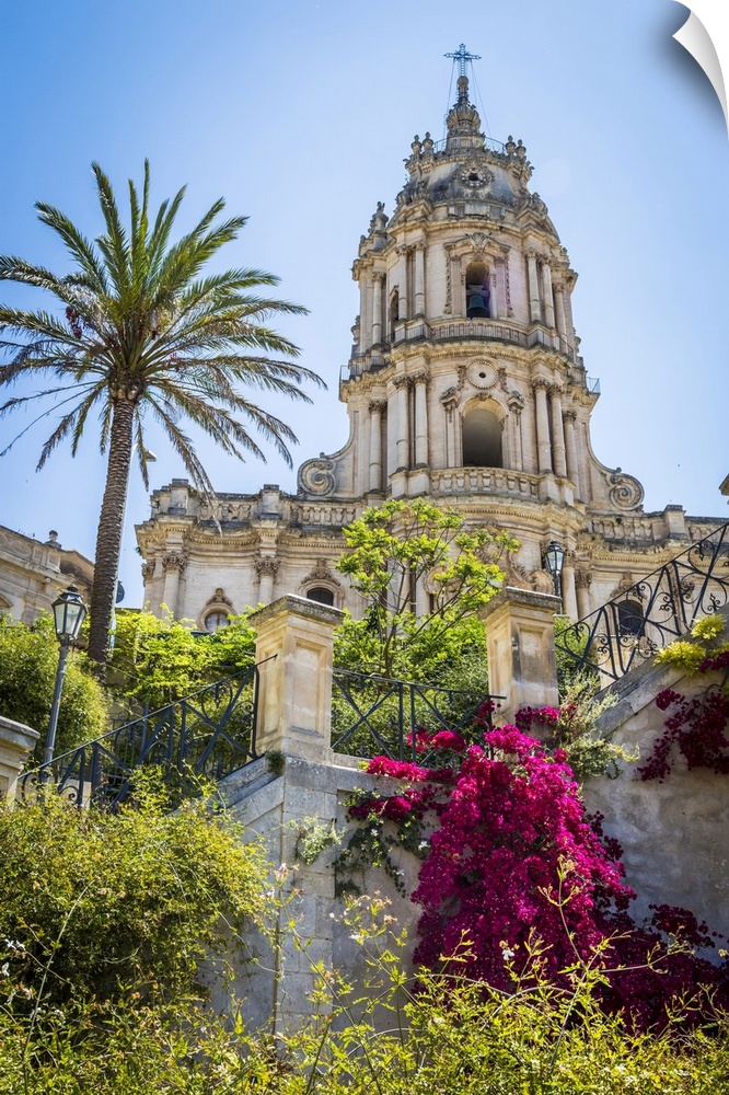 The dome of the baroque Cathedral of San Giorgio with gardens in historical Modica in the Provnice of Ragusa in Sicily, Italy