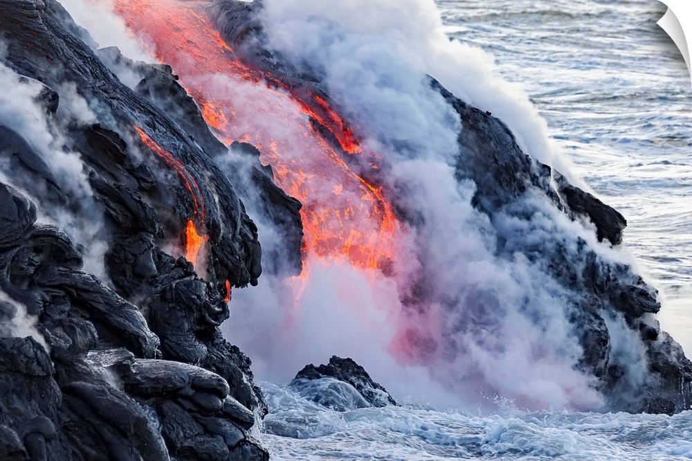 The Pahoehoe lava flowing from Kilauea has reached the Pacific ocean near Kalapana; Island of Hawaii, Hawaii, United State...
