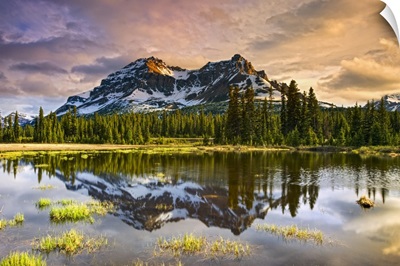 Tranquil Lake Reflecting Forest And Rugged Mountains, Banff National Park, Canada