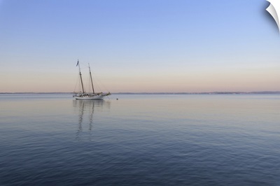 Two Masted Sailboat Anchored On Lake Garda At Dawn At Bardolinoin Veneto, Italy