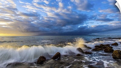 Waves Hit Rocks On A Pacific Beach In Maui