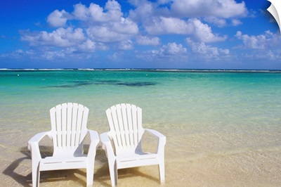 White Beach Chairs On Beautiful Beach, Clear Turquoise Water