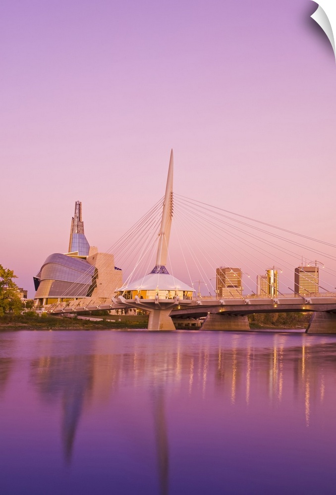 Winnipeg skyline from St. Boniface showing the Red River, Esplanade Riel Bridge and Canadian Museum for Human Rights; Winn...