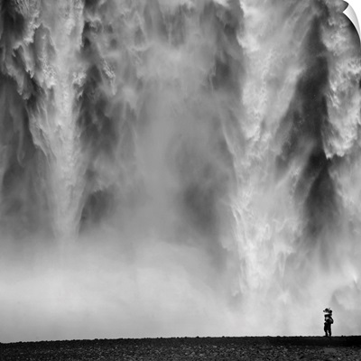 Black and White Photo of waterfall with person