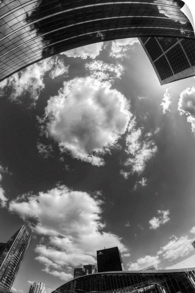 Black and white photograph of the sky in the city