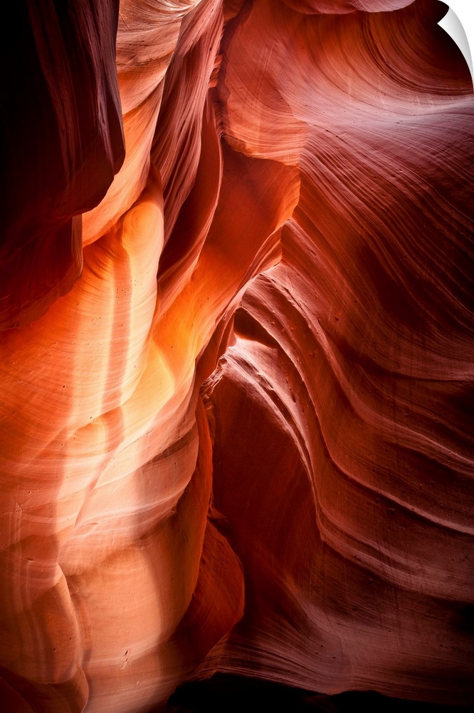 Landscape photograph of sandstone walls inside a canyon cave.