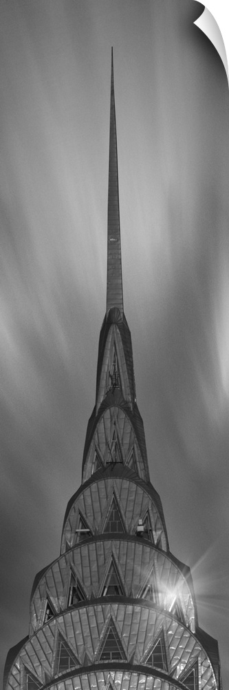 A photograph of the Chrysler building taken in black and white.