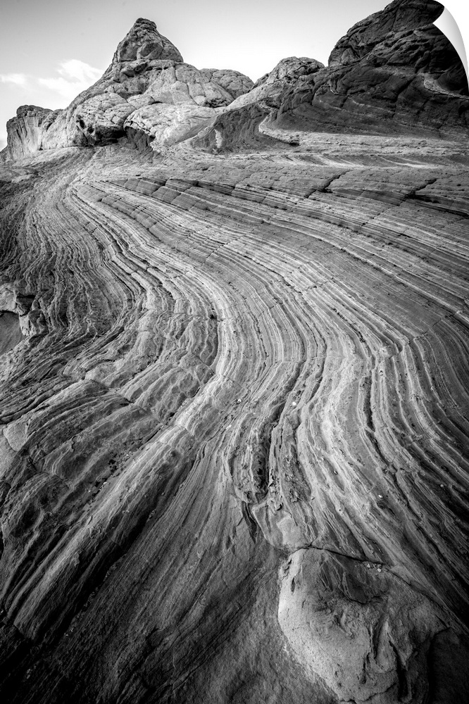 Black and white photograph highlighting the textures from the layers of rock.
