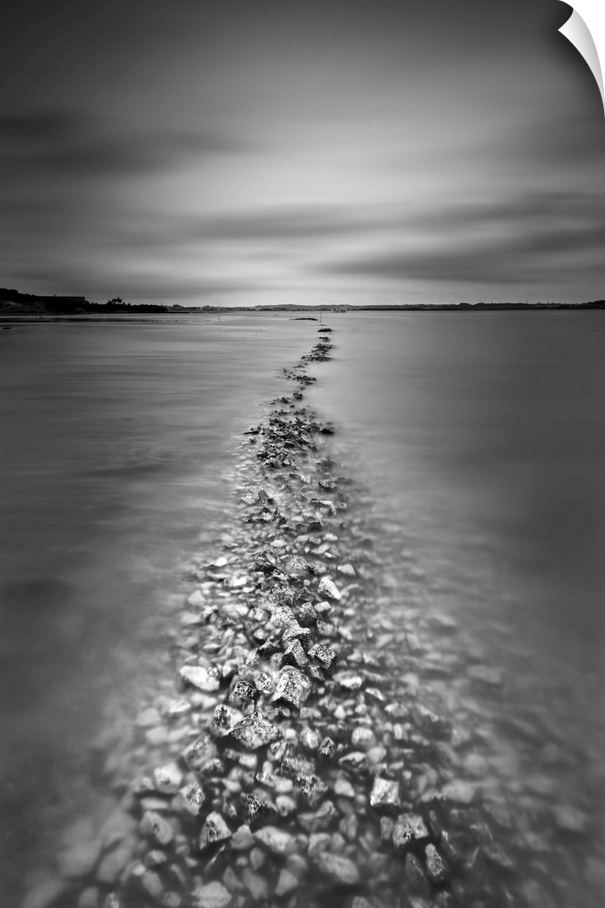 Rocks through the water black and white photograph