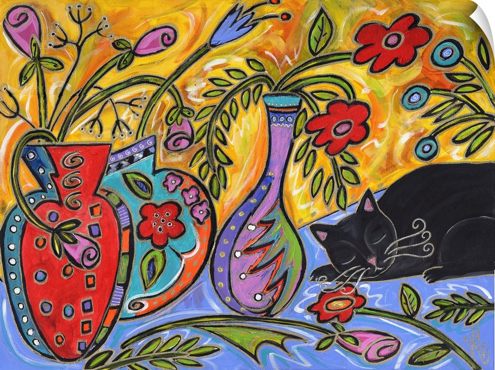 A black cat sleeping next to colorful vases full of flowers.