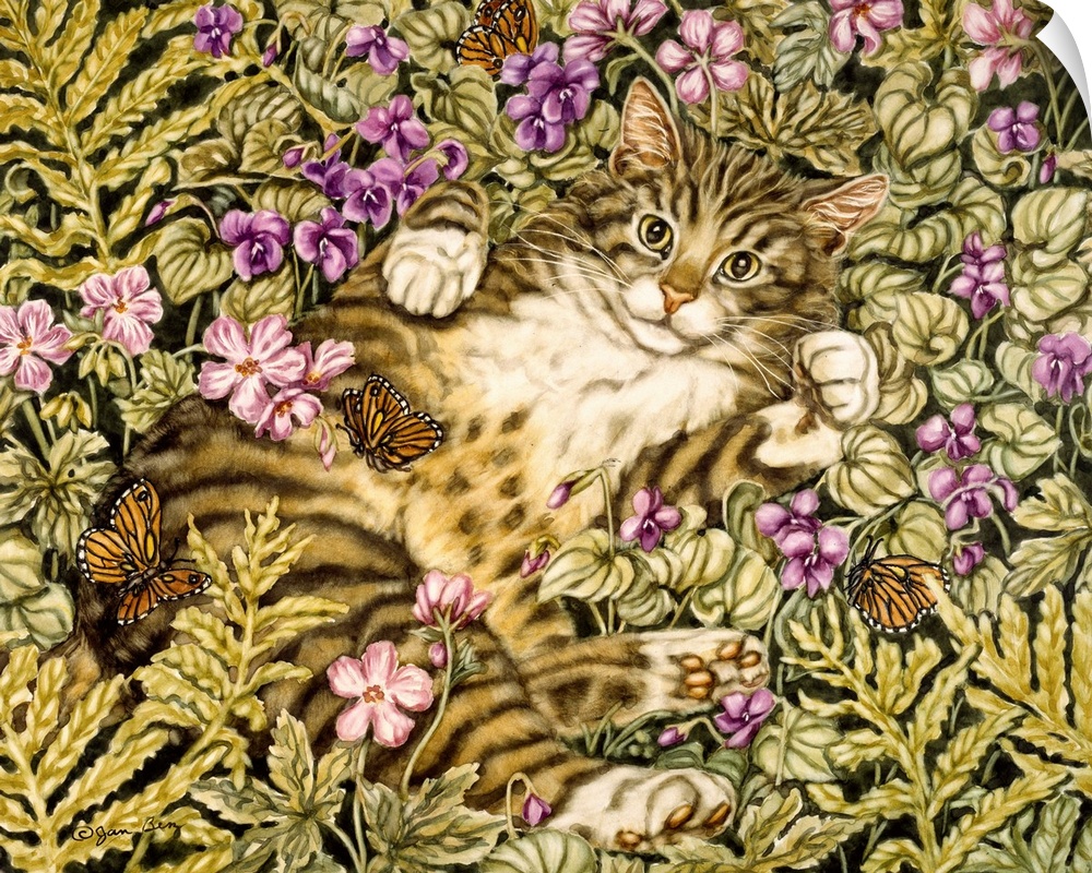 Domestic tiger cat lays on its back in a bed of ferns and flowers batting at butterflies.
