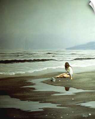 Girl Sitting On Beach Watching The Tide