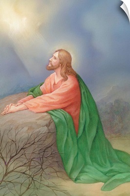 Jesus kneeling by a rock, praying