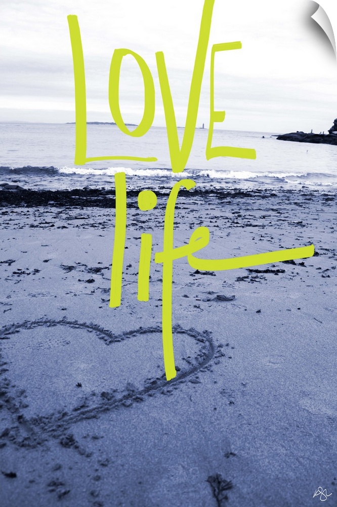 "Love Life" handwritten over a photograph of a heart drawn in the sand on a beach.