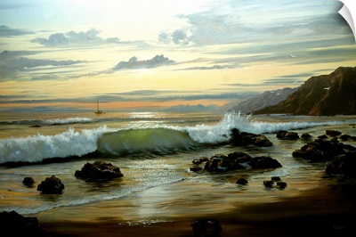 Ocean Waves On Rocky Beach At Sunset