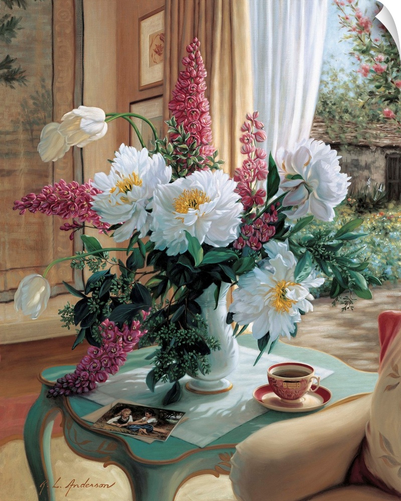 Bouquet of Peonies, French Tulips and delphiniums in a vase on a table with coffee cup by a window.
