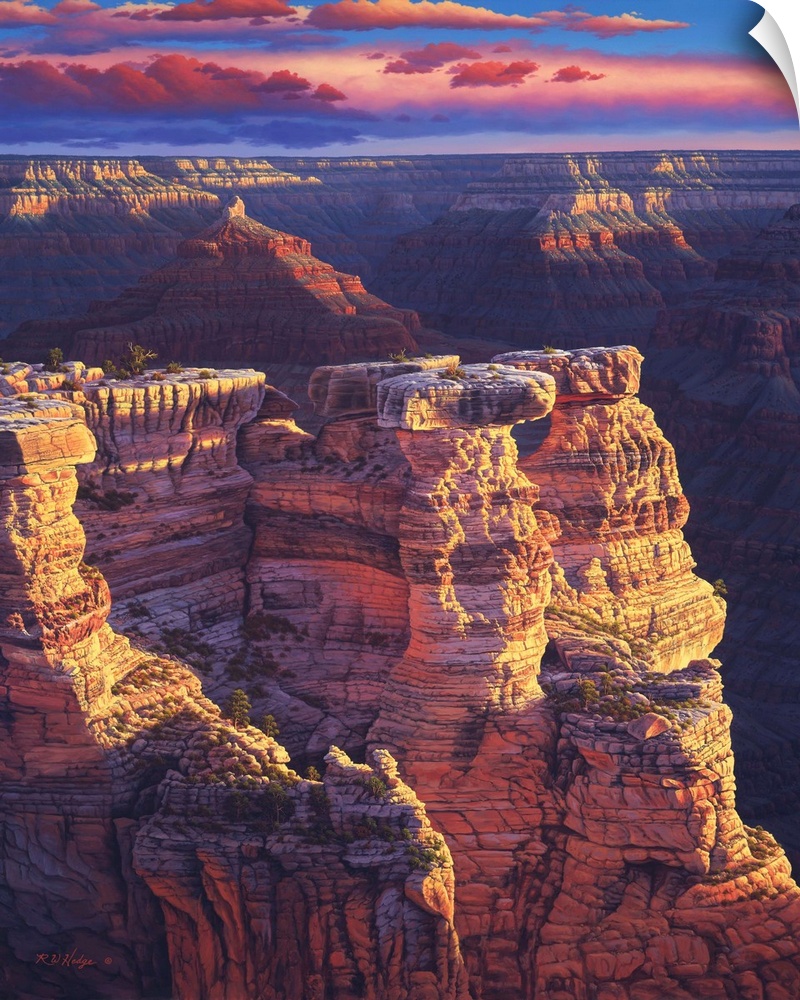 The sun setting on the cliffs of the Grand Canyon.
