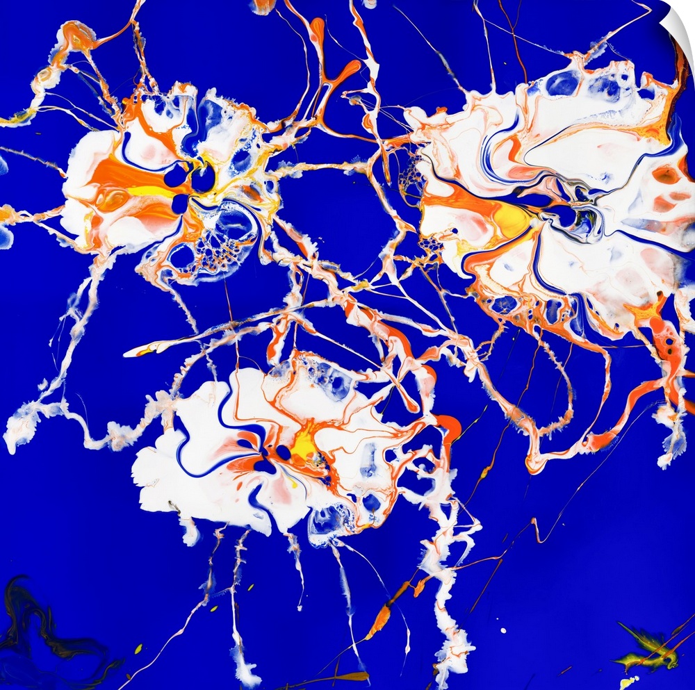 Floral painting in pouring technique using white, orange and yellow paint on a contrasting background of indigo blue.