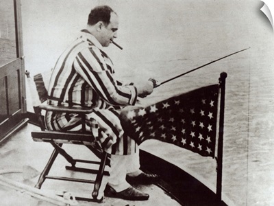 Al Capone (1899-1947) fishing on his yacht