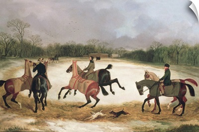 Grooms exercising racehorses