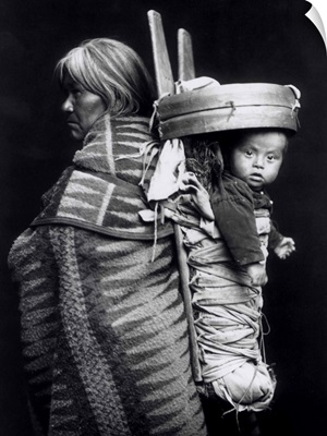 Navaho woman carrying a papoose on her back, c.1914