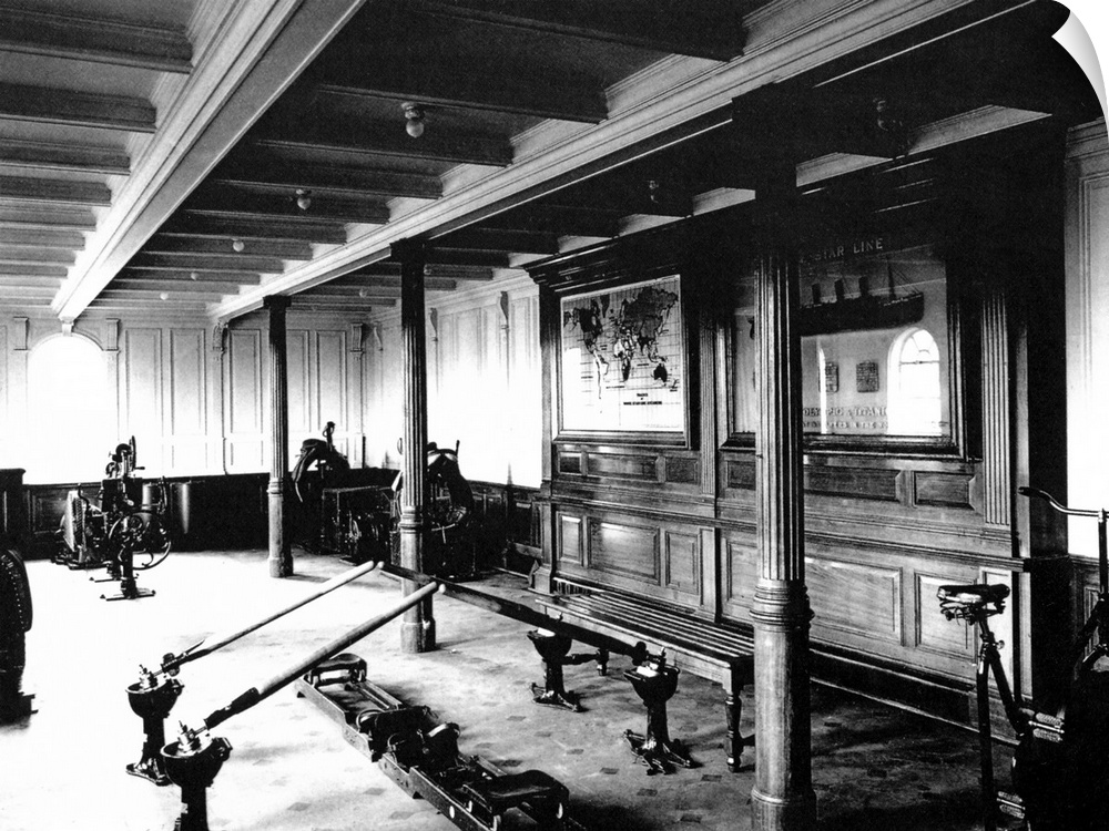 Landscape, vintage photograph from 1912 of the exercise room on the Titanic, including a rowing machine and stationary bikes.