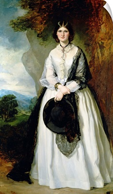 Young woman in white dress against a landscape