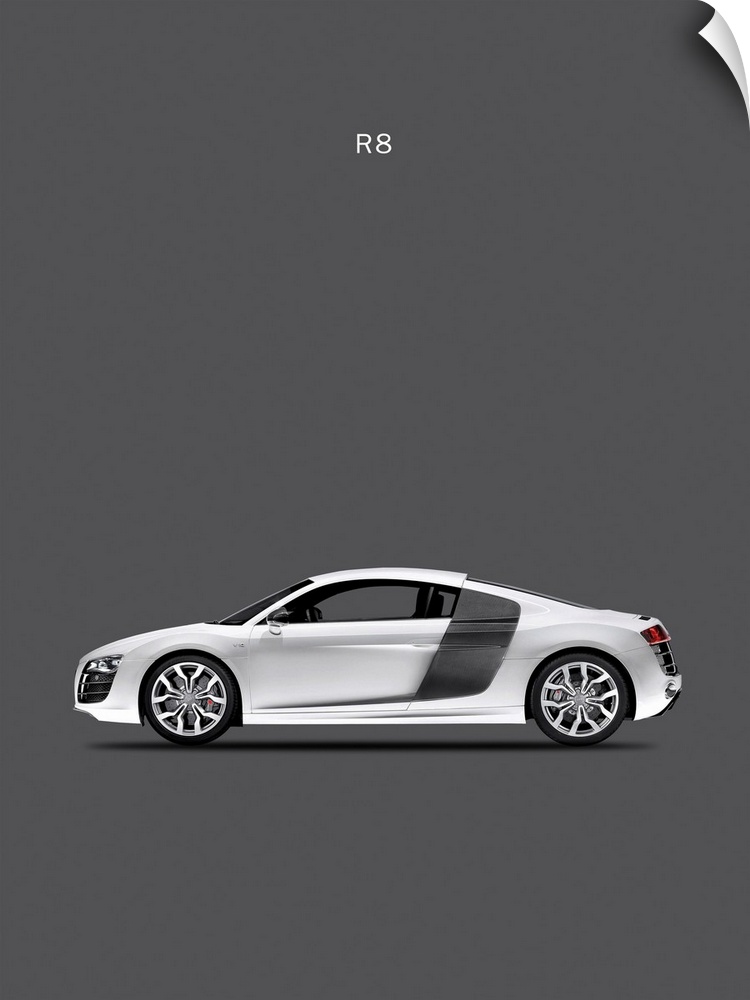 Photograph of a silver Audi R8 printed on a dark gray background