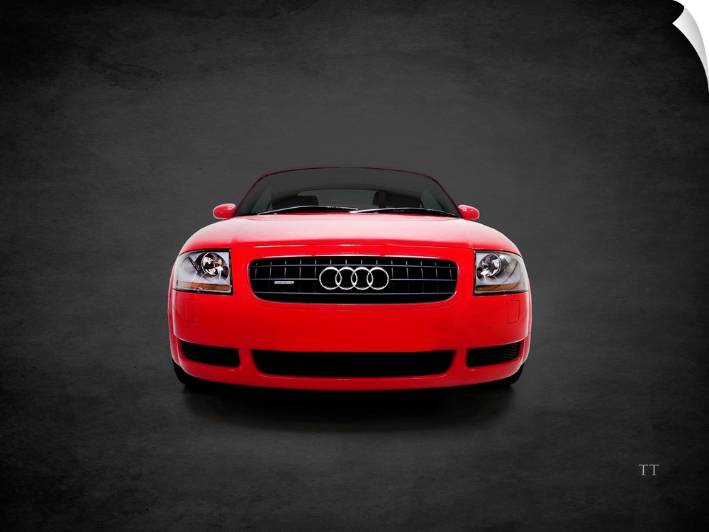 Photograph of a red Audi TT Quattro printed on a black background with a dark vignette.