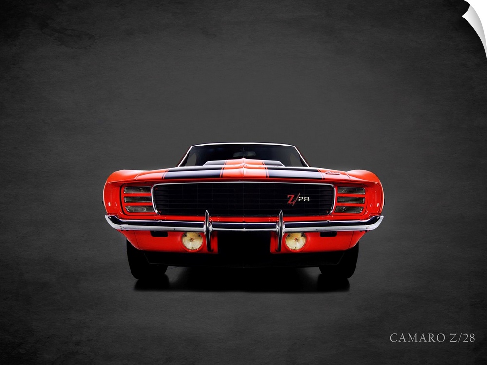 Photograph of a red 1969 Chevrolet Camaro Z28 printed on a black background with a dark vignette.