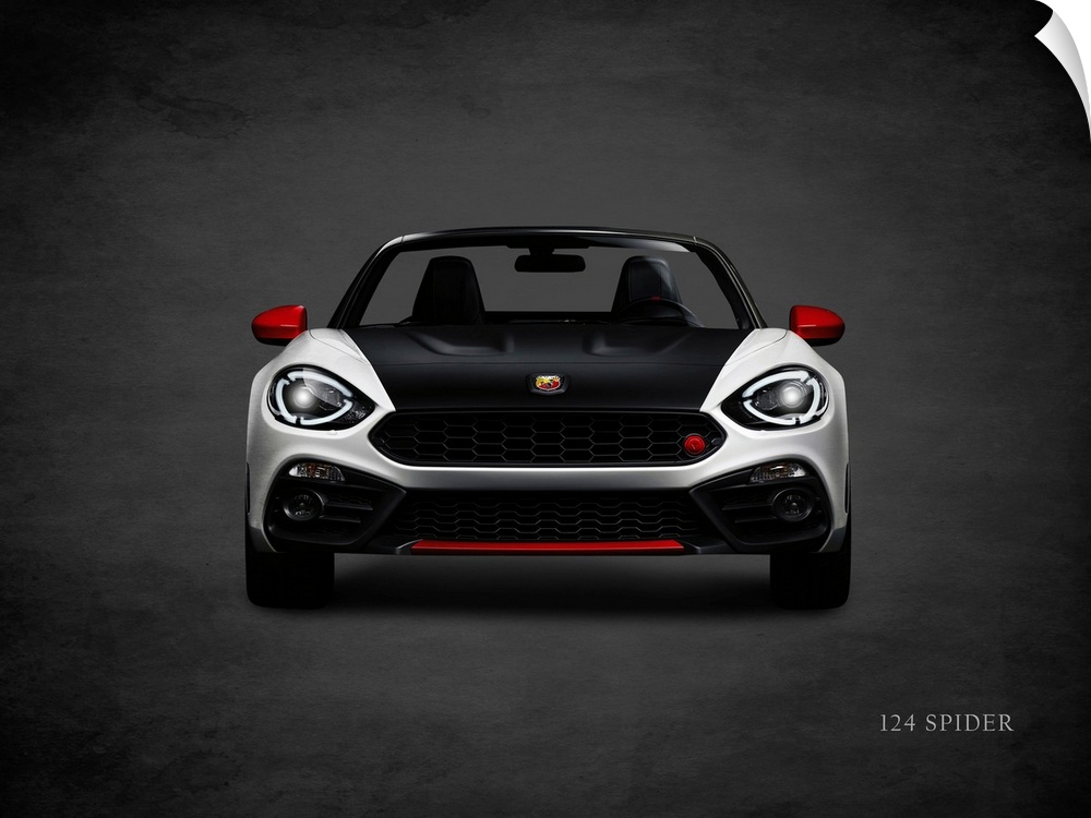 Photograph of a silver, black, and red Fiat 124 Spider printed on a black background with a dark vignette.