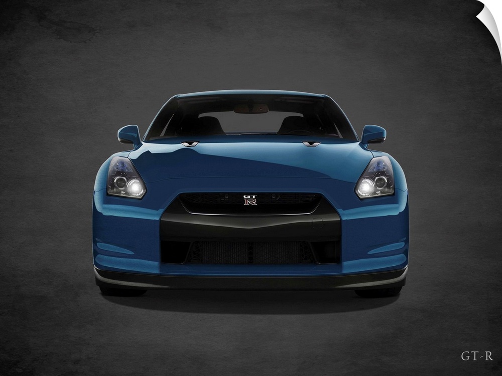 Photograph of a blue Niassn GT-R printed on a black background with a dark vignette.