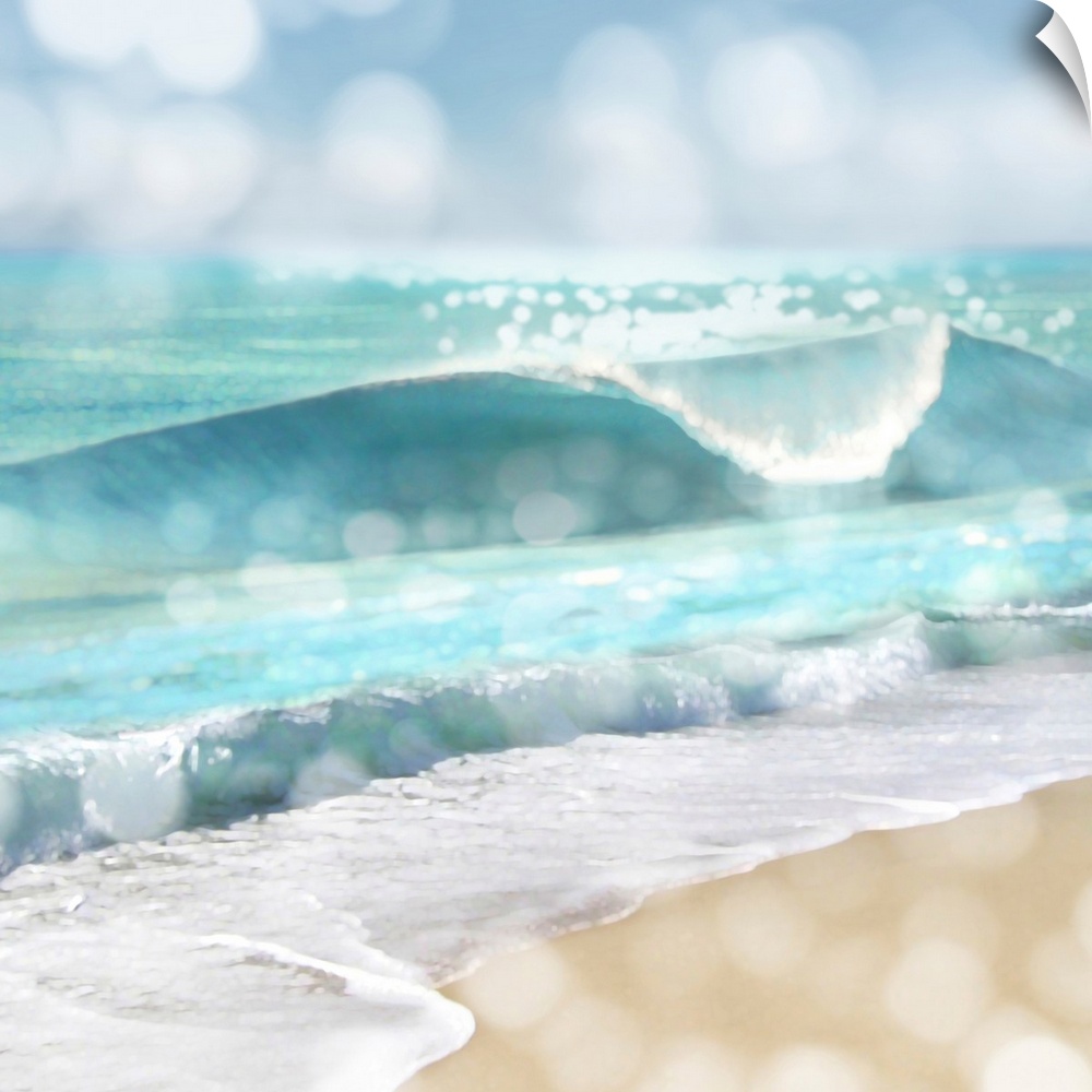 Square photograph of beach waves and the shore with a bokeh effect.