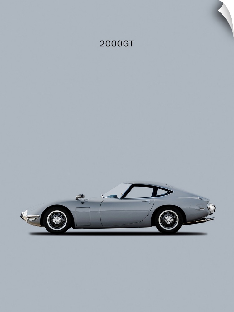 Photograph of a silver Toyota 2000GT printed on a gray background