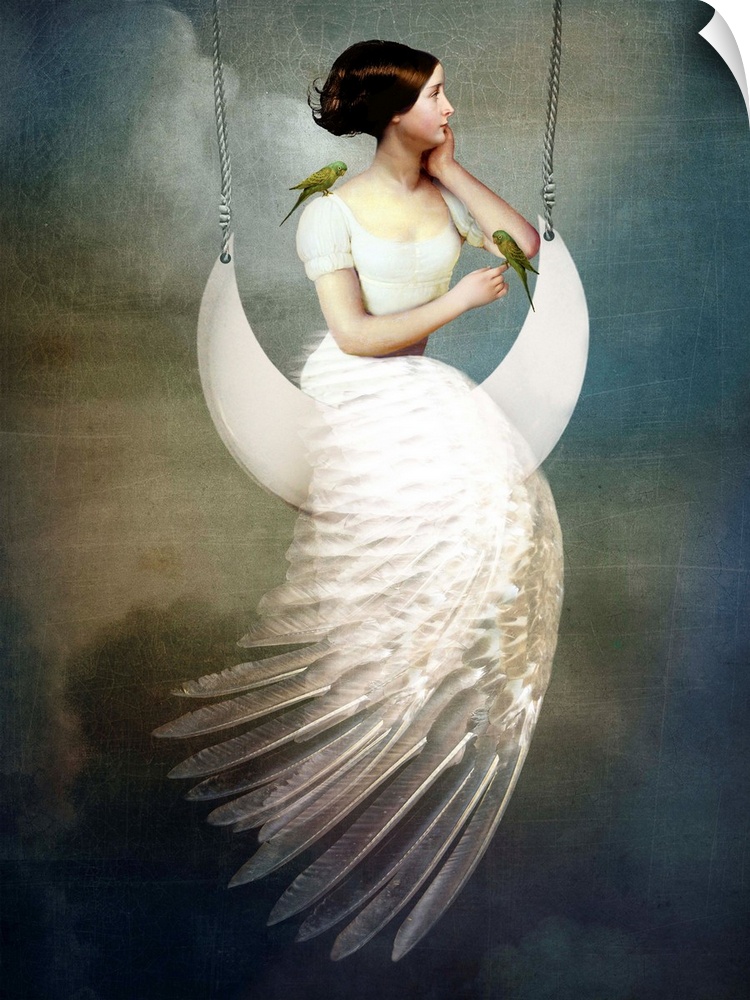 A conceptual portrait of a female with a feather dress sitting on a moon swing.