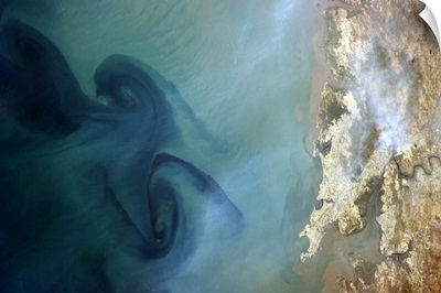 Huge swirls in the sea off of Mumbai, India