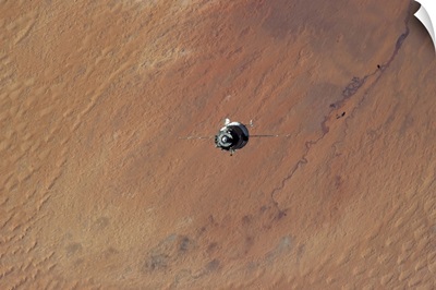Soyuz in the Desert - coming up to dock with the Sahara below