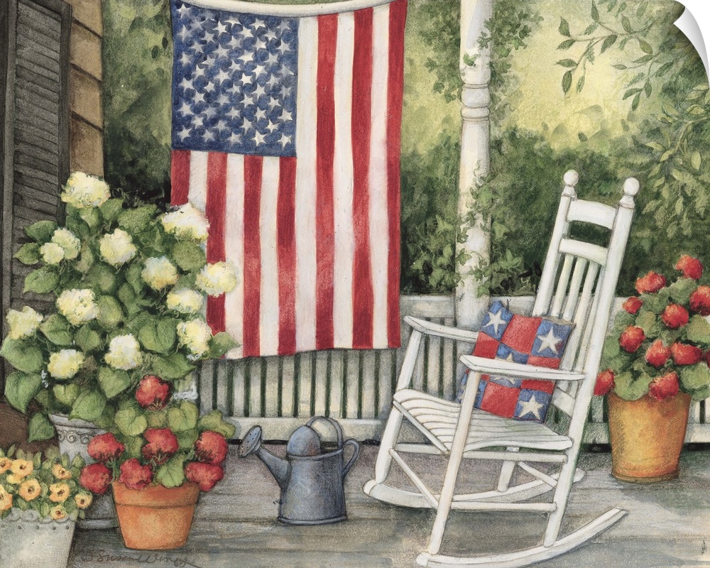 Front porch setting with white rocking chair, flowers and big american flag.