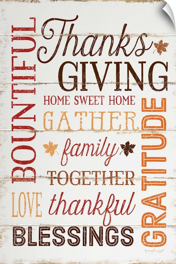 Thanksgiving themed typography artwork in festive fall colors against a rustic wooden background.