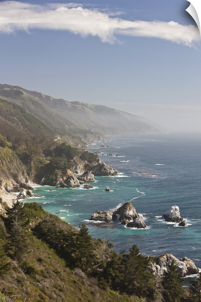A sunny view of the dramatic California Big Sur coastline.