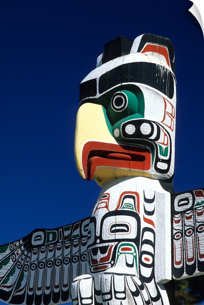 A totem pole In Vancouver, Canada...totem pole, eagle, wood, carving, northwest indians, native, wood, carve, vancouver, c...