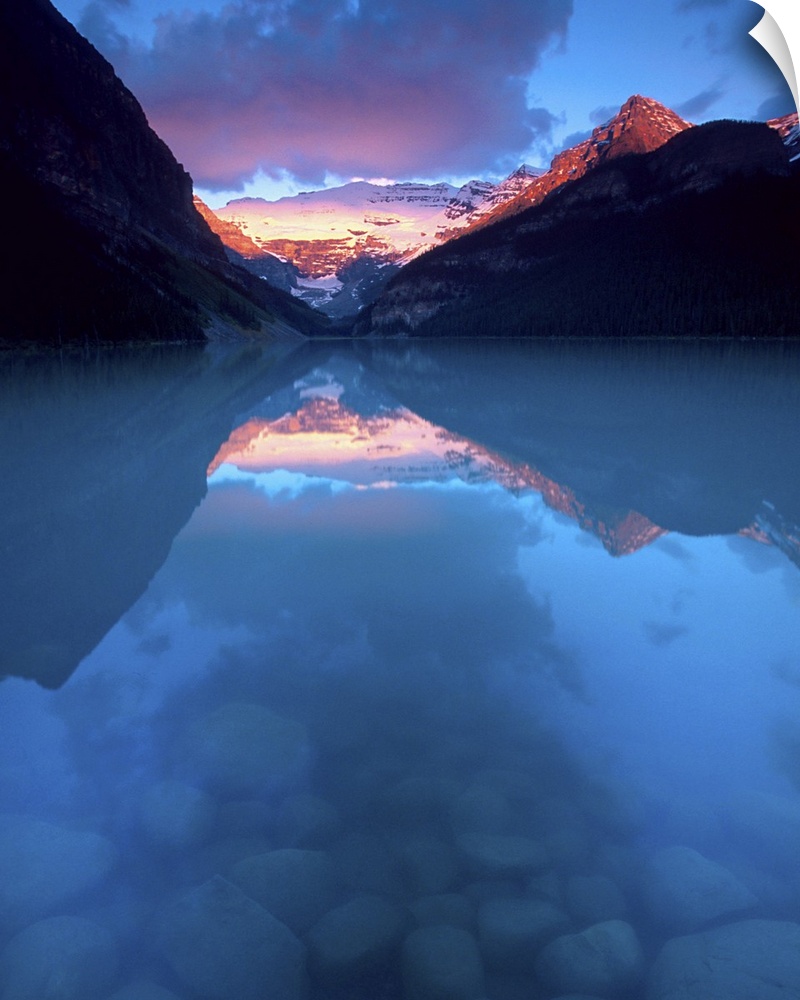 Canada, Alberta, Banff National Park. Sunrise reflects Victoria Glacier on Lake Louise. Credit as: David W. Kelley / Jayne...