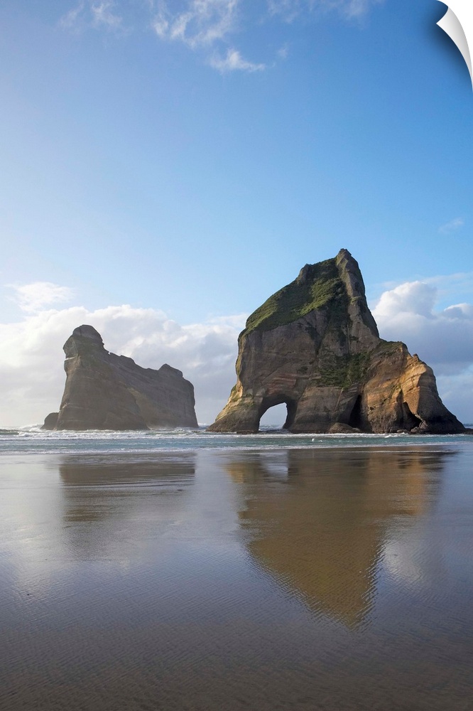 Archway Islands Reflected in Wet Sands of Wharariki Beach, near Cape Farewell, North West Nelson Region, South Island, New...