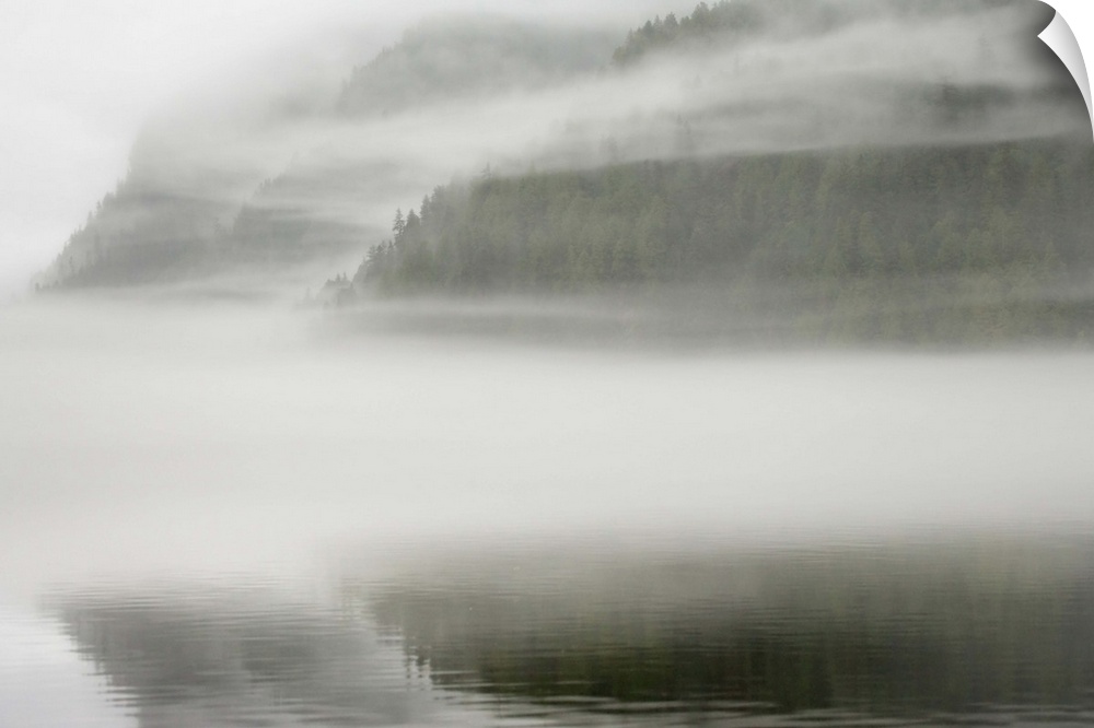 Canada, British Columbia, Calvert Island. Mist and fog shroud water and forested island. Credit as: Don Paulson / Jaynes G...