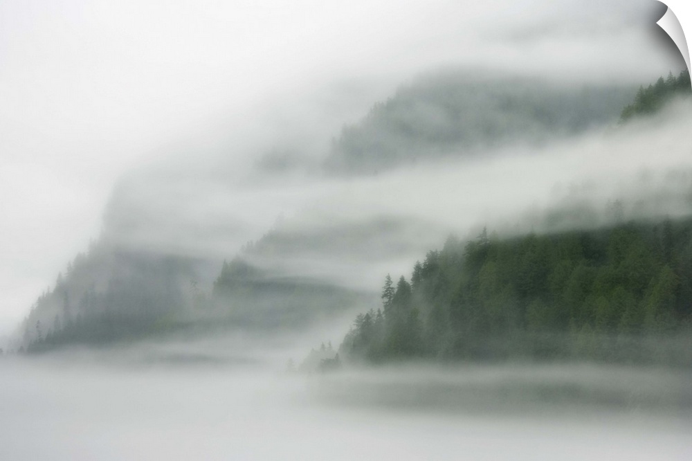 Canada, British Columbia, Fiordland Recreation Area. Mist and fog shroud water and forested island. Credit as: Don Paulson...