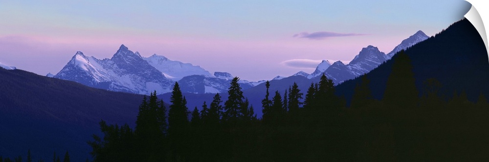 Canada, British Columbia, Mt Terry Fox. Mount Terry Fox turns periwinkle in the settling dusk, British Columbia, Canada.