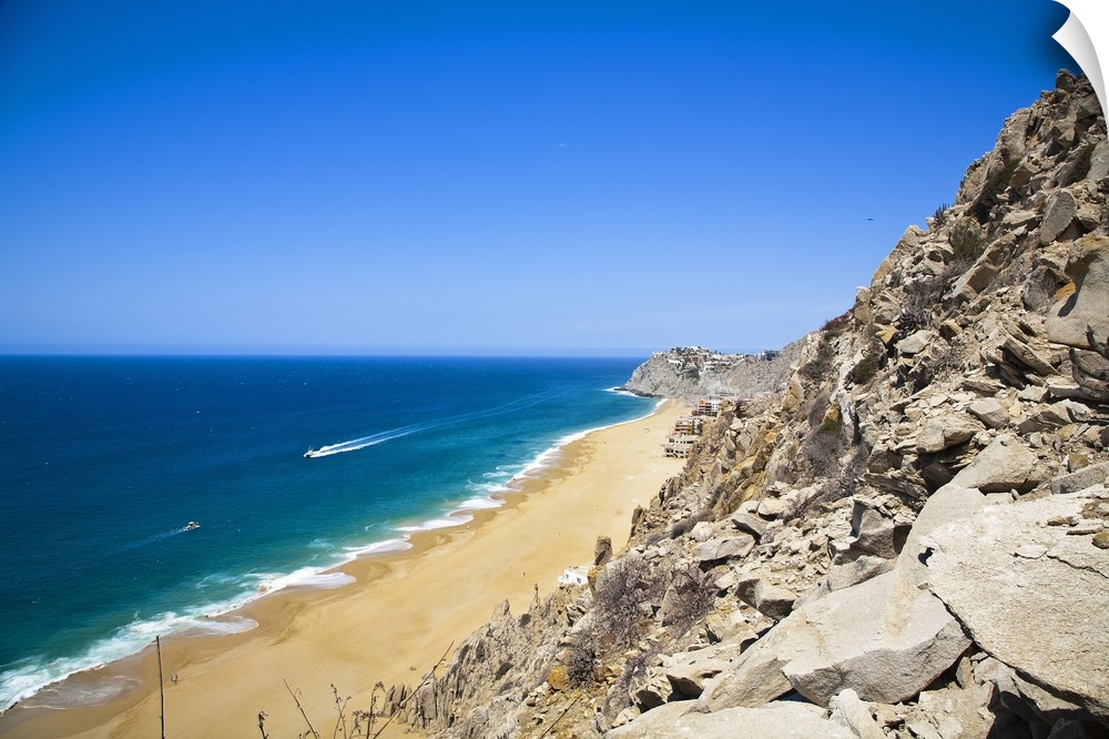 Cabo San Lucas, Baja California Sur, Mexico. A beach with a large rock formation.