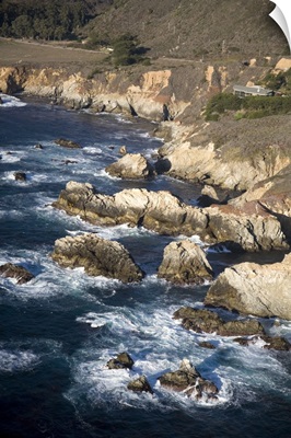California, Big Sur, cliffs drop down to the sweeping coastline on Highway 1